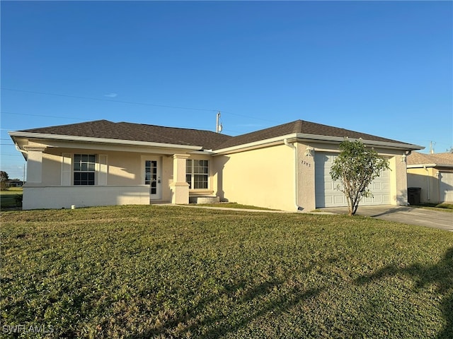 ranch-style house with a garage and a front lawn