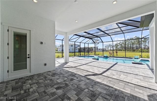 14111 Calaveras Ct, Estero, FL 33928 - outdoor pool featuring a patio area and glass enclosure