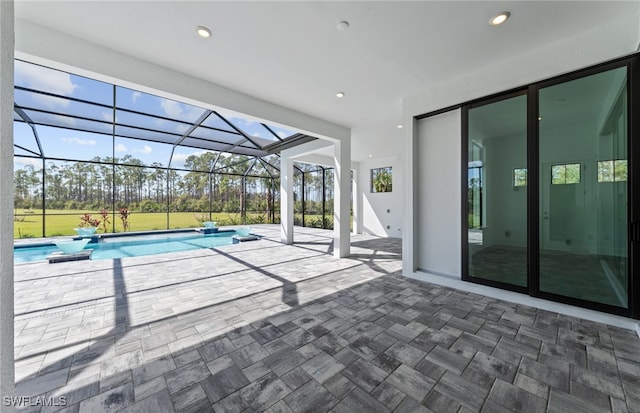 view of patio / terrace featuring a lanai