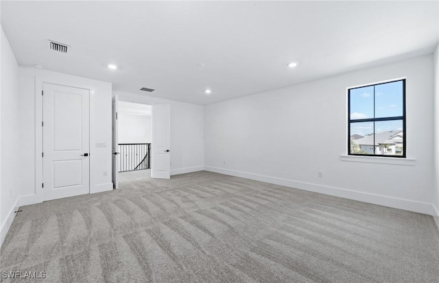 14111 Calaveras Ct, Estero, FL 33928 - empty room featuring carpet flooring, baseboards, and recessed lighting