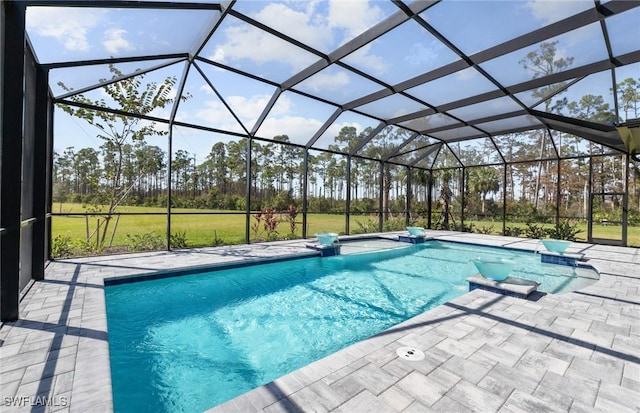 14111 Calaveras Ct, Estero, FL 33928 - swimming pool featuring a patio, view of wooded area, and a lanai