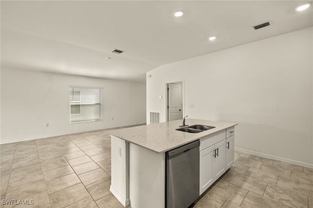 kitchen featuring a center island with sink, sink, stainless steel dishwasher, light stone countertops, and white cabinetry