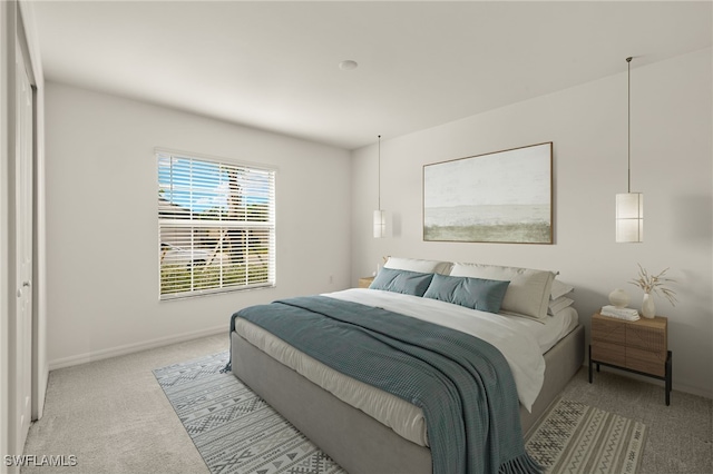 bedroom featuring light colored carpet