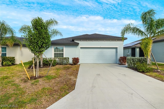 single story home with a garage