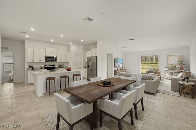 tiled dining area with sink