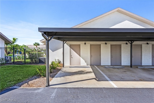 garage featuring a carport