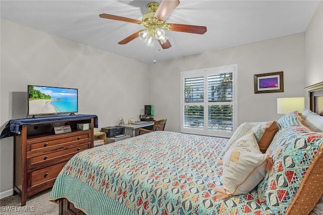 bedroom featuring light colored carpet and ceiling fan