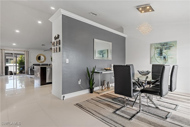 tiled dining room featuring ornamental molding