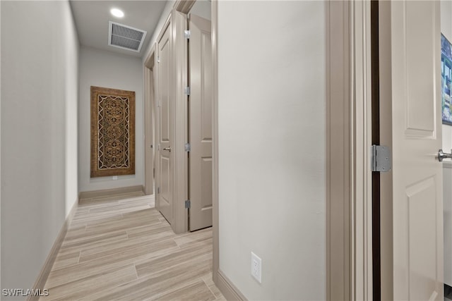 hallway featuring light wood-type flooring