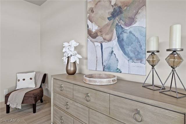 living area with light hardwood / wood-style flooring