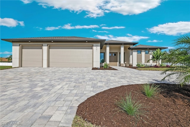 prairie-style home with a garage