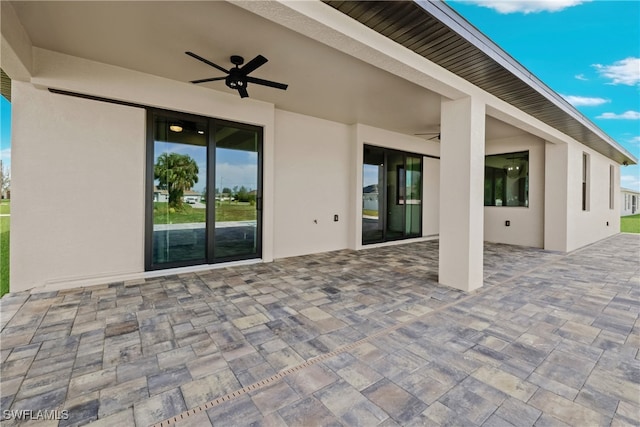 view of patio / terrace featuring ceiling fan