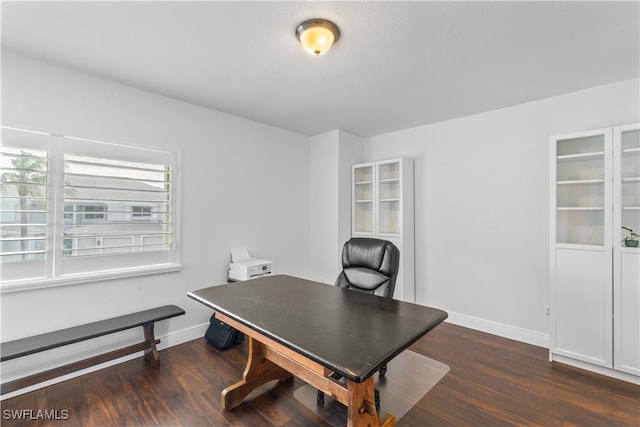 office with wood finished floors and baseboards