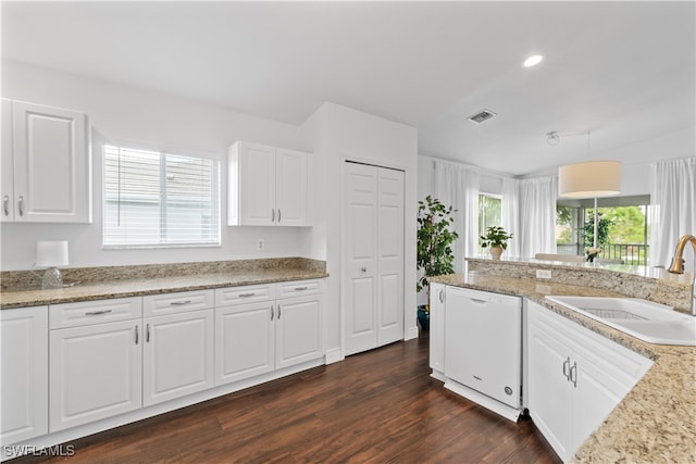 kitchen featuring visible vents, dark wood-type flooring, white cabinetry, white dishwasher, and a sink