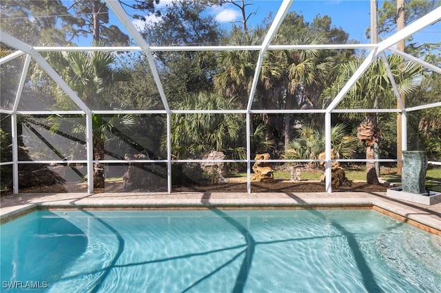 view of pool featuring a lanai