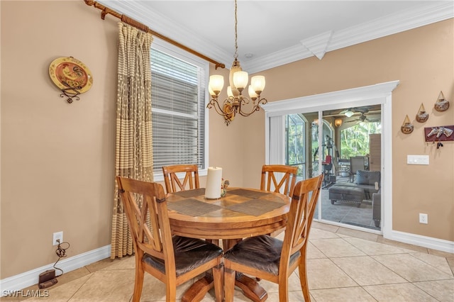 dining room featuring light tile patterned floors, ceiling fan with notable chandelier, and ornamental molding