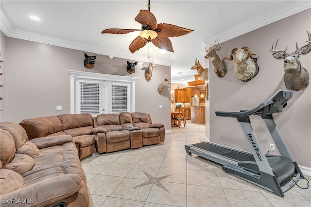 interior space with crown molding, light tile patterned floors, and ceiling fan