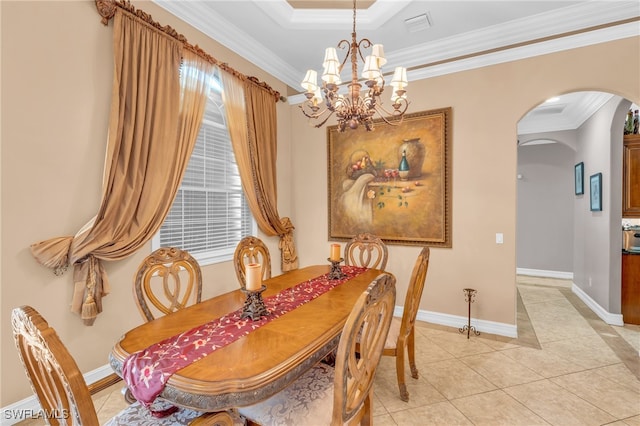 tiled dining area featuring crown molding and a notable chandelier