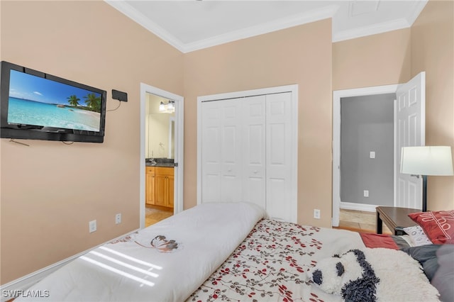 tiled bedroom with ensuite bath, a closet, and ornamental molding