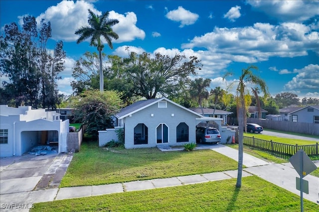 ranch-style house with a front yard