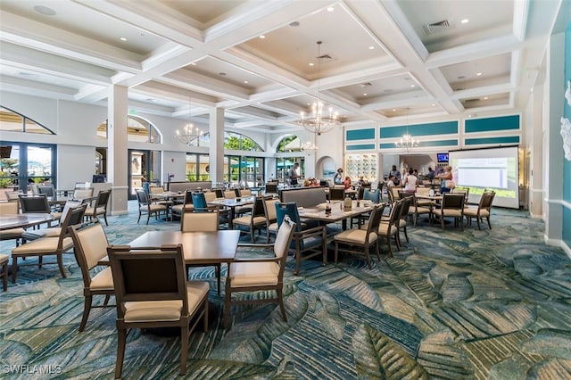 carpeted dining space with beamed ceiling, a high ceiling, and coffered ceiling