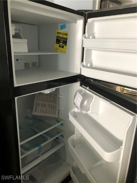 interior details featuring white refrigerator