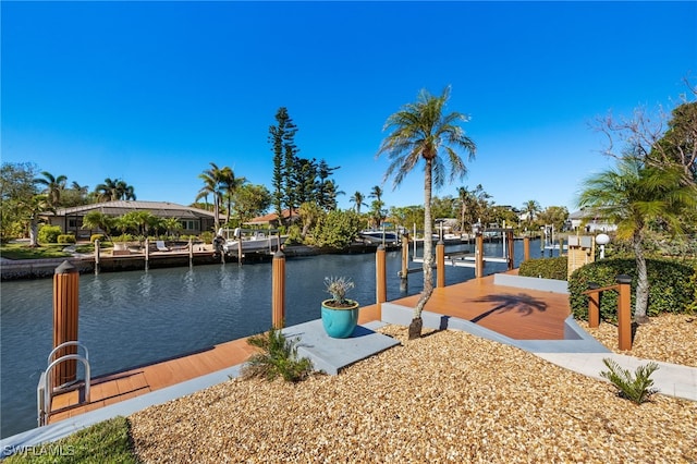 dock area featuring a water view