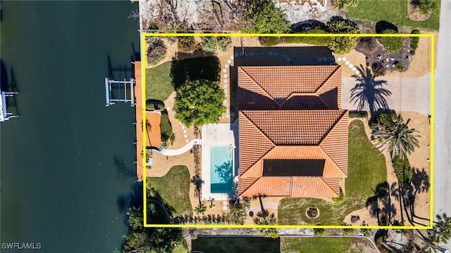 birds eye view of property featuring a water view