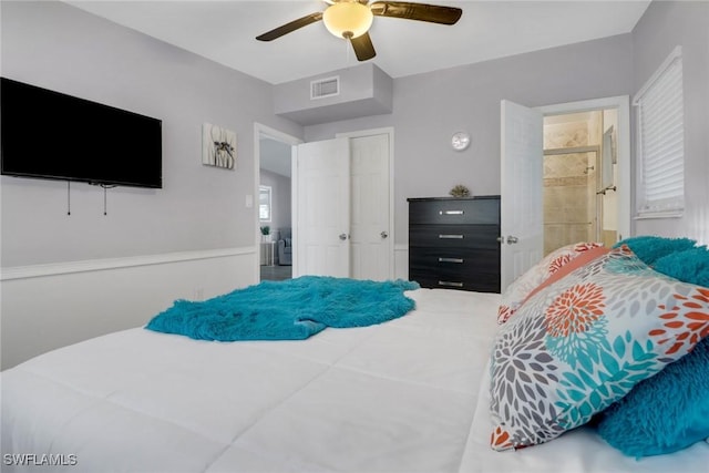 bedroom featuring a ceiling fan and visible vents