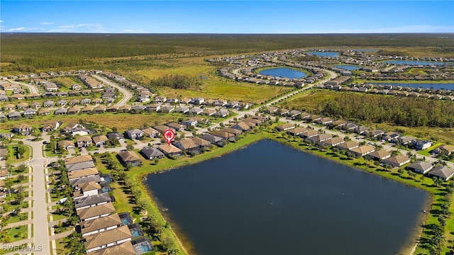 drone / aerial view with a water view