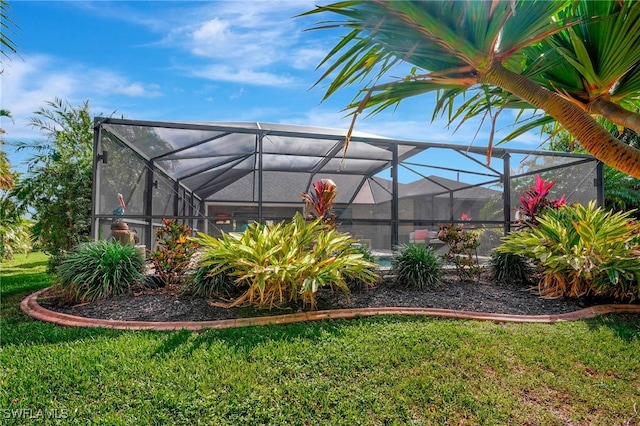 view of yard with a lanai