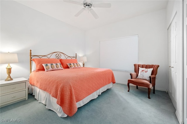 carpeted bedroom featuring ceiling fan