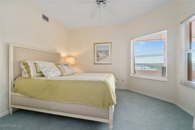 bedroom featuring ceiling fan and carpet floors