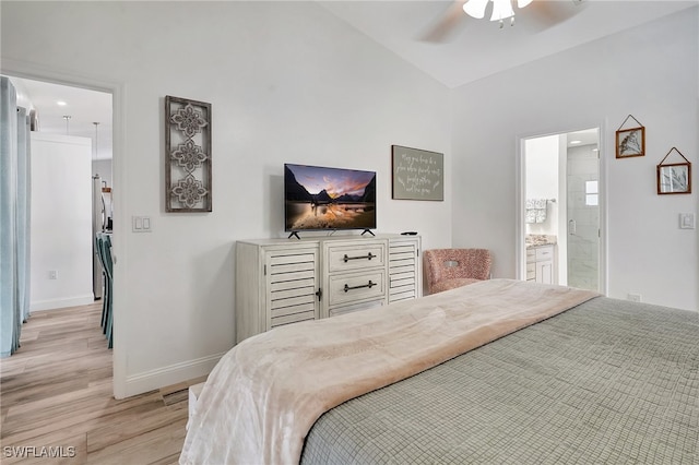 bedroom featuring ensuite bath, ceiling fan, and light hardwood / wood-style flooring