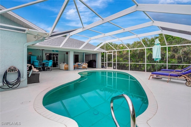 view of pool featuring a patio area and a lanai