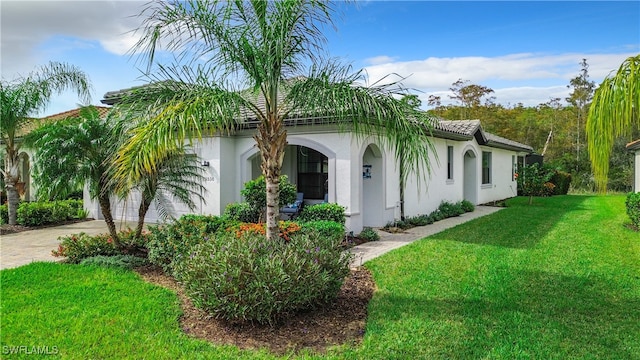 view of front of home with a front yard