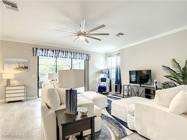 living room with ceiling fan and ornamental molding