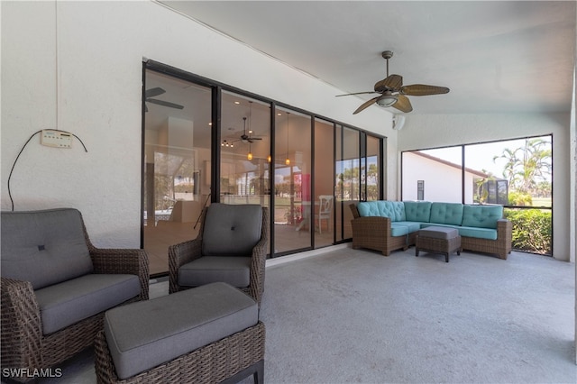 sunroom with ceiling fan