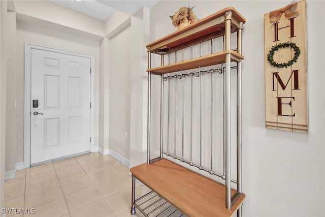 mudroom with light tile patterned floors