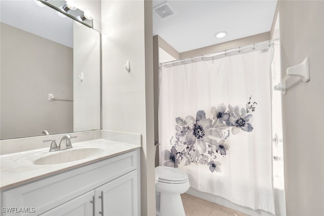 full bathroom featuring tile patterned floors, shower / bathtub combination with curtain, vanity, and toilet