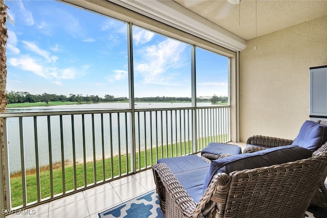 sunroom with a water view