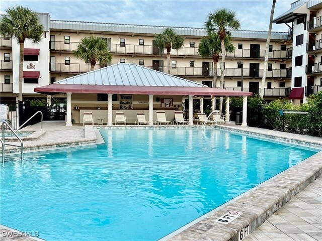 view of pool featuring a gazebo and a patio