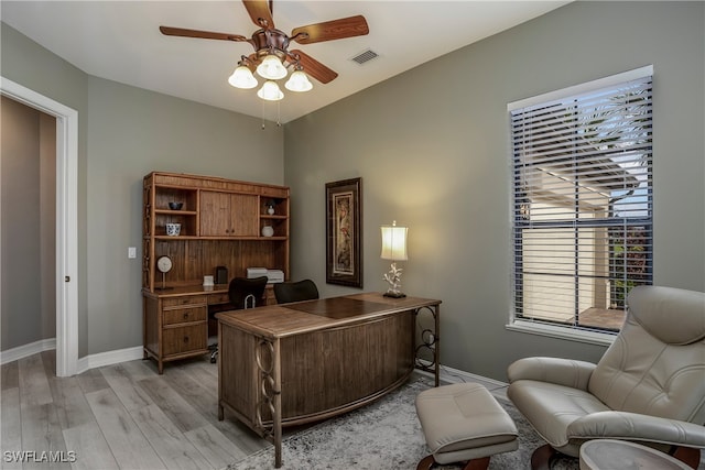 office area with ceiling fan and light wood-type flooring