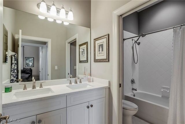 full bathroom with shower / bath combination with curtain, toilet, and vanity