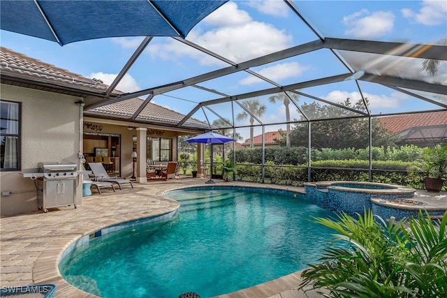 view of swimming pool with an in ground hot tub, area for grilling, a lanai, and a patio area