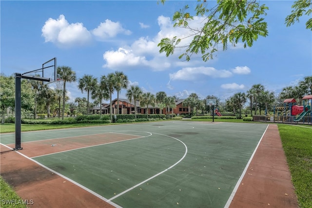 view of sport court featuring a playground