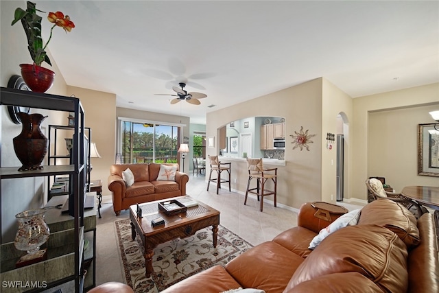 living room featuring ceiling fan