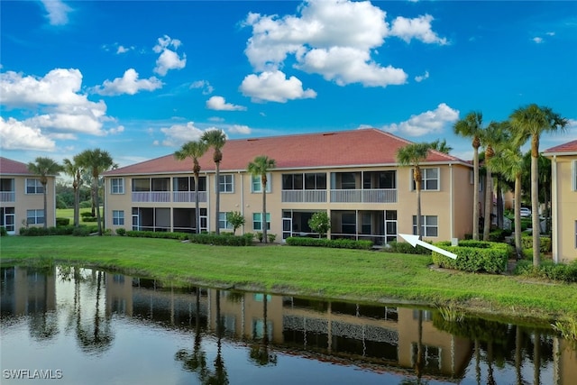 exterior space with a water view