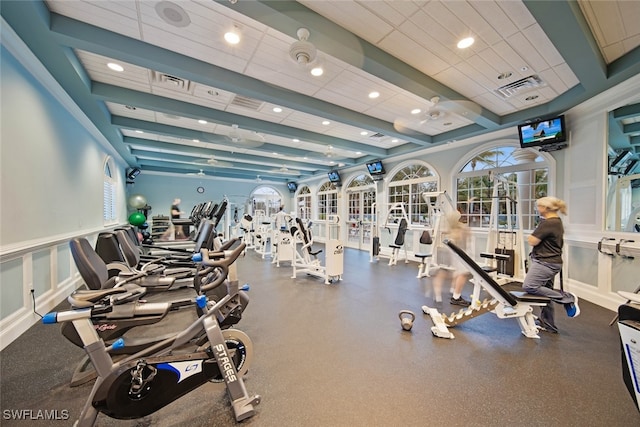 exercise room with a drop ceiling