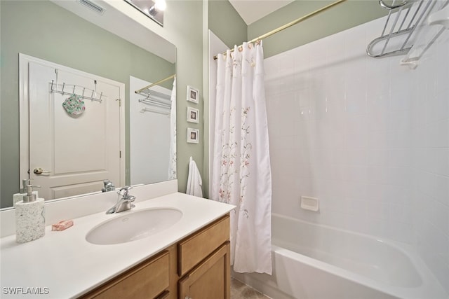 bathroom with vanity and shower / bath combination with curtain